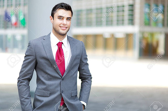 Portrait of an handsome young manager outdoor